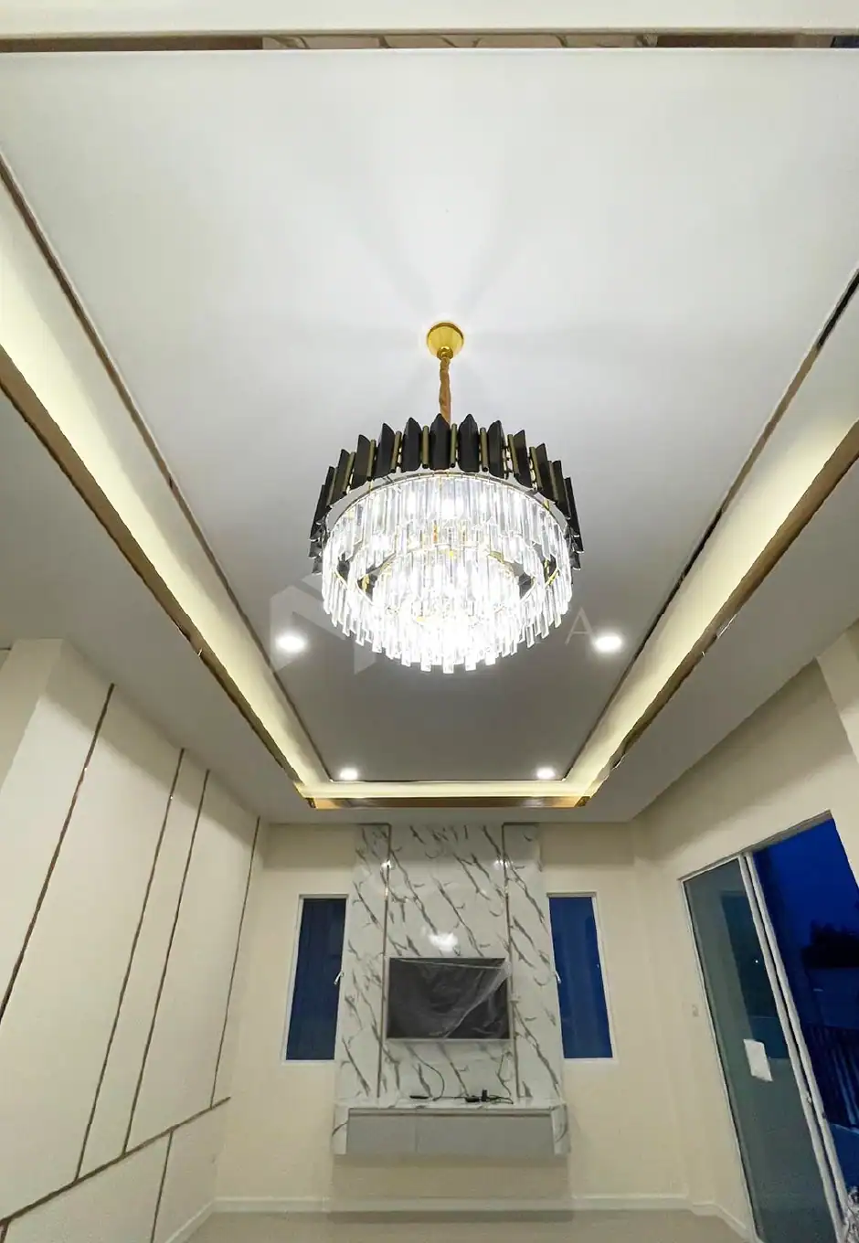 Luxurious gold-colored stainless steel decorative trim used for ceiling accents in modern interior design.