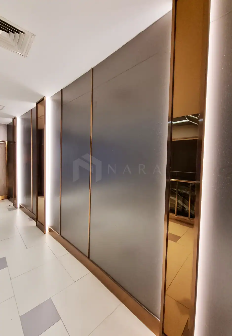 Sleek gold stainless steel decorative trims and panels for modern interior design, adding luxury and elegance to walls and surfaces with high-quality stainless steel finishes.