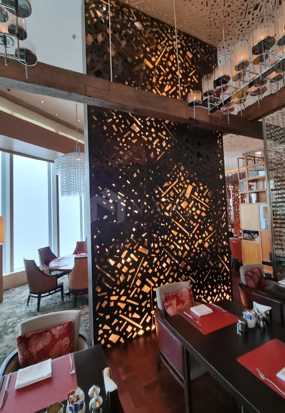 Stylish gold stainless steel trim and decorative stainless steel accents used in upscale restaurant interior design.